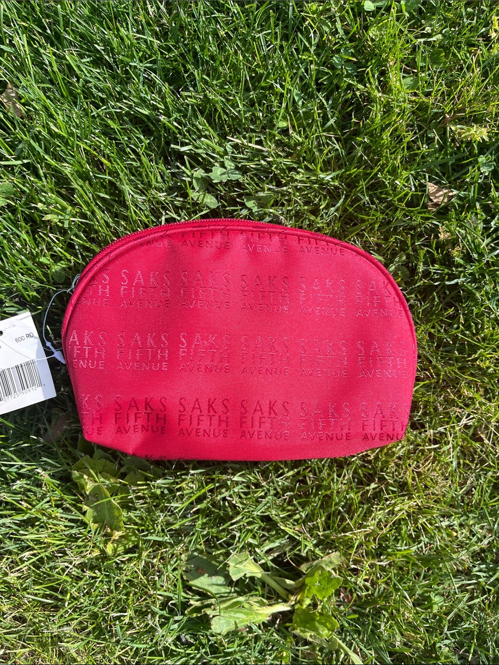 Saks Fifth Avenue Red Embossed Logo Cosmetic Pouch